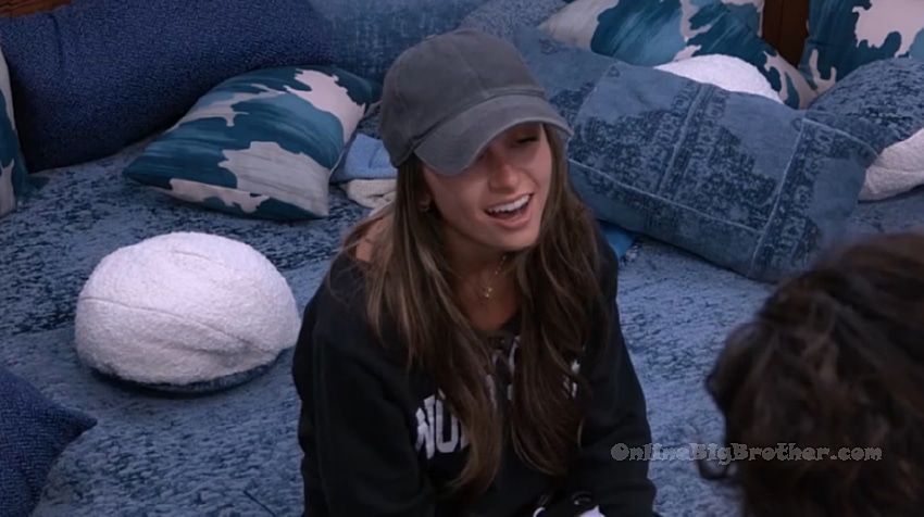 Taylor laughing while talking to Jason in the Big Brother house about her conversation with HOH Dee