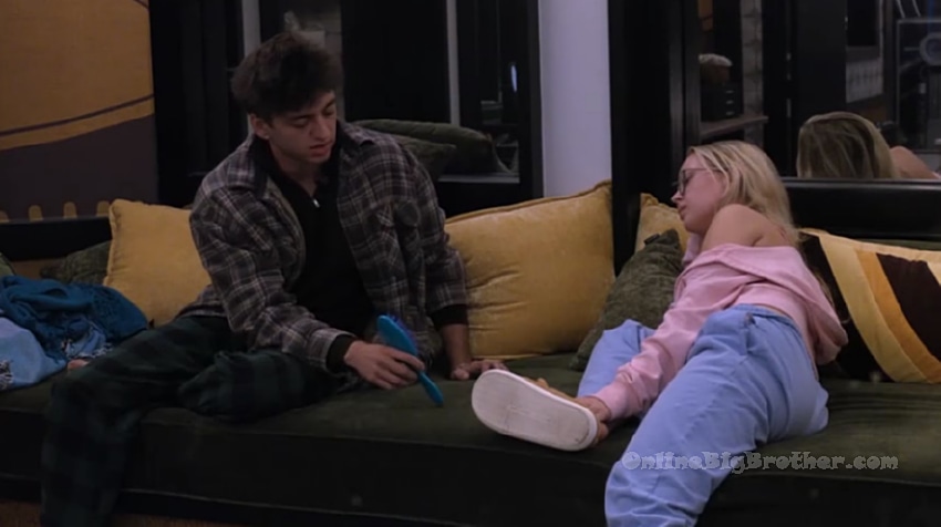 Chuk and Haley talking on a couch with yellow pillows, discussing house alliances around 3:00 am