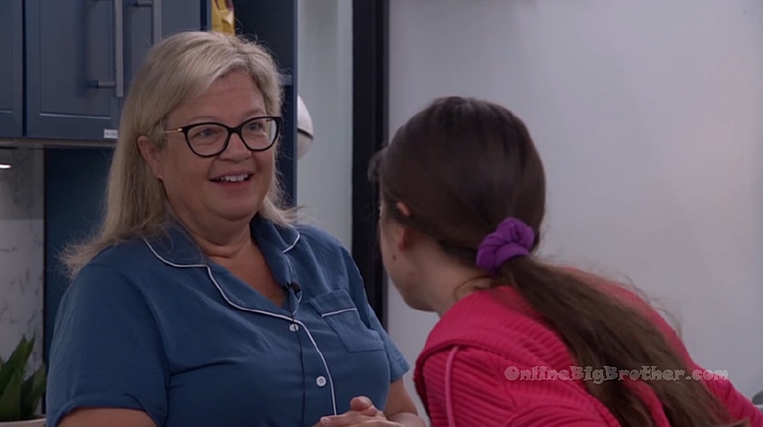 Angela talking with Mallory in the Big Brother house kitchen area