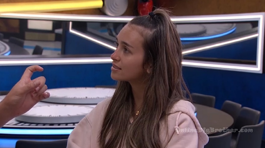 Lyric wearing a satin bonnet and University of Georgia sweatshirt, listening intently during her late-night conversation with Rome