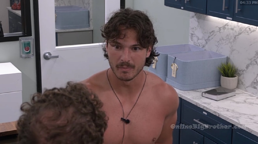 Rome talking with Devens in the Big Brother house at 4:33 pm