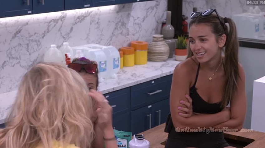 Lyric and Mallory talking in the storage room before Melody joins their conversation
