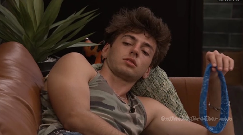 Rome relaxing on the couch before Melody joins the storage room conversation with Lyric and Mallory