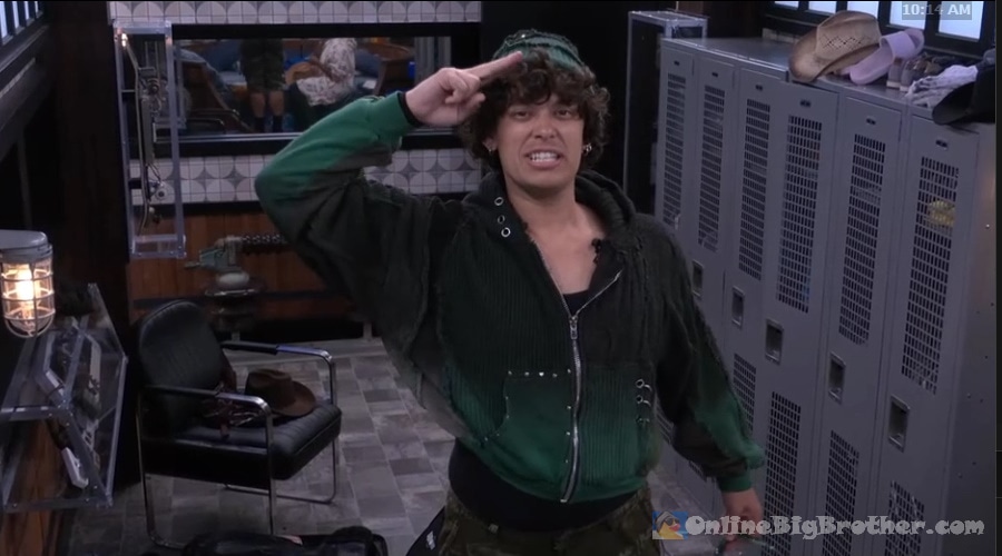 Jason goofing around in the Big Brother house, giving a salute while campaigning for Rome, Taylor, or Jason to win the power