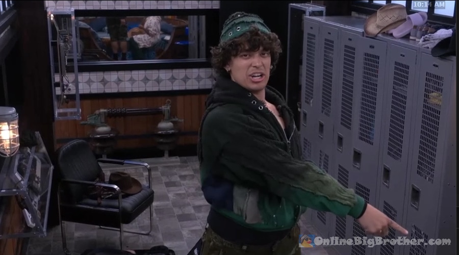 Jason goofing around in the Big Brother house, pointing and campaigning for votes for Rome, Taylor, or Jason to win the power