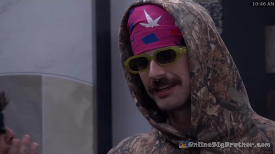 Jason wearing a camo hoodie, pink headband, and yellow sunglasses while talking to Barrett around 11:46 AM