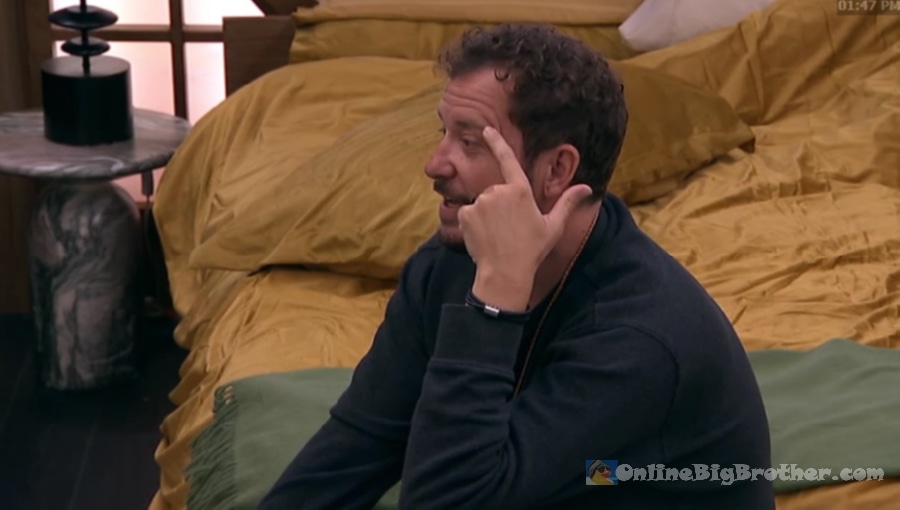 Devens sits on a bed gesturing thoughtfully at 1:47 PM, just before his final nomination speech prep with Dee