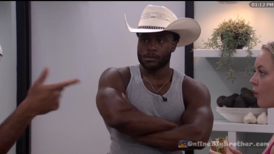 Chuk, wearing a cowboy hat and arms crossed, listens during the 1:12 PM conversation with Melody and Yash