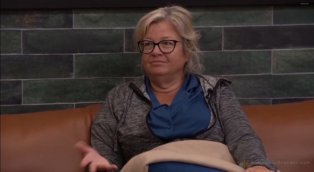 Angela sits on the HOH bed explaining to Taylor that the nominations were Dee's call, not hers