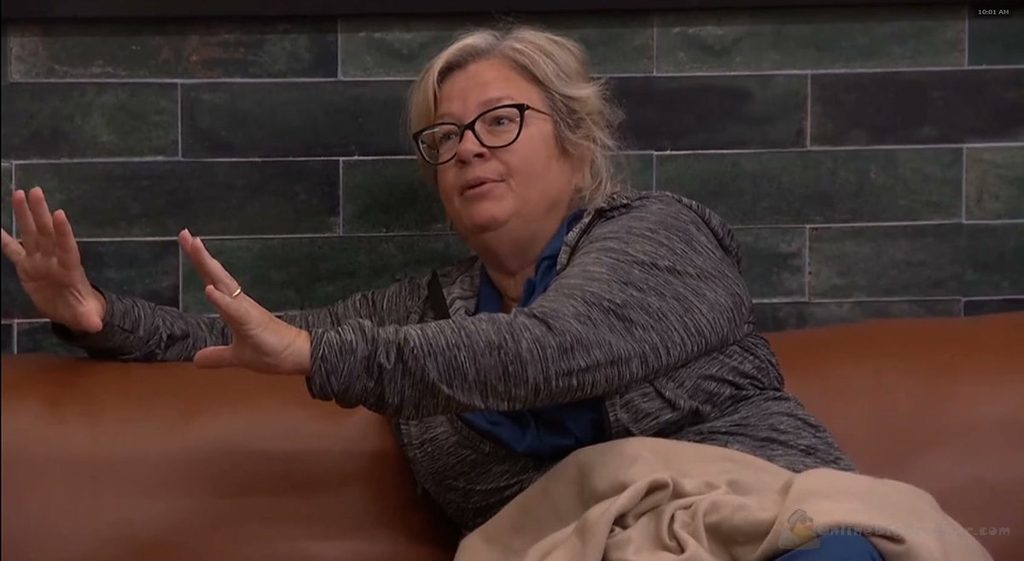 Angela sits on the HOH bed explaining to Taylor that the nominations were Dee's call, not hers